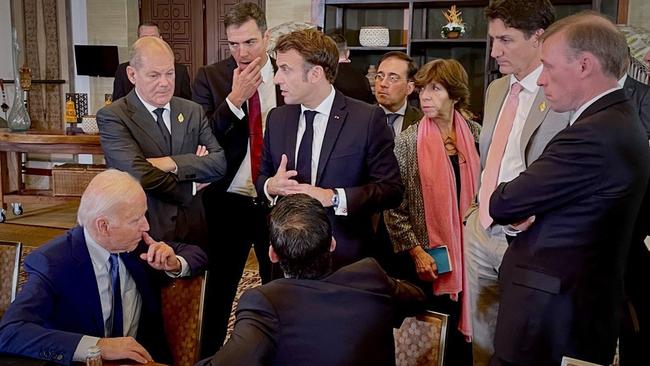 Joe Biden, left, German Chancellor Olaf Scholz, Spanish Prime Minister Pedro Sanchez, Emmanuel Macron, Rishi Sunak and Justin Trudeau in Bali after the missile strike on Poland. Picture: Reuters