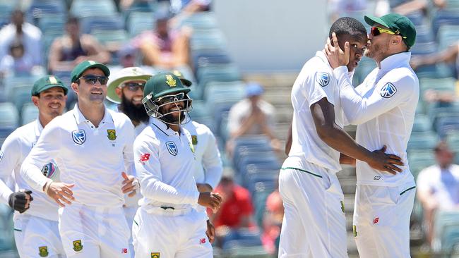 Fast-bowling sensation Rabada gets a kiss from his captain. Picture: Daniel Wilkins