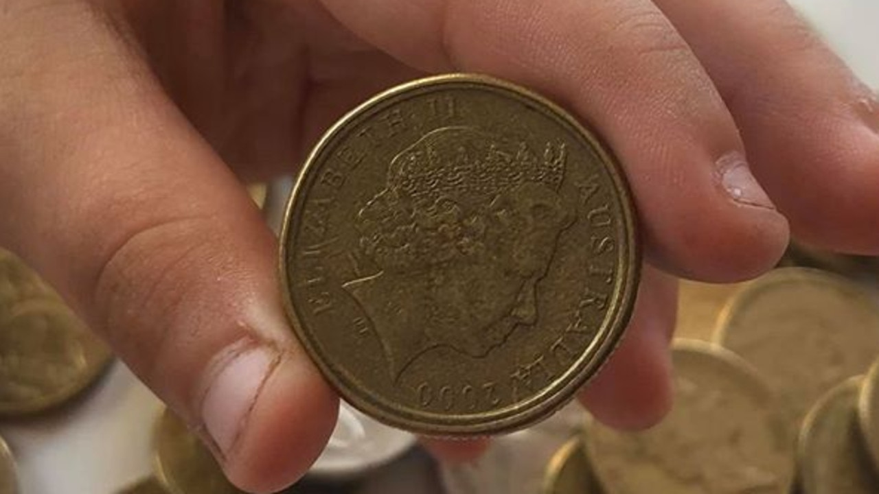 The double rim is clearly seen on the coin.