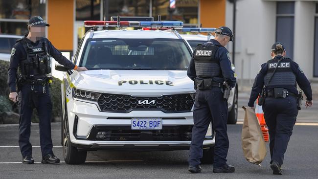 Police at the scene at Minicozzi shopping centre Payneham road. Pic Roy VanDerVegt