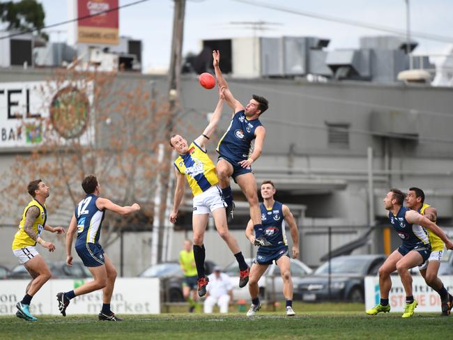 Mornington’s Dylan Jones and Northern’s Jordan Perry clash in the interleague game earlier this year. Picture: James Ross