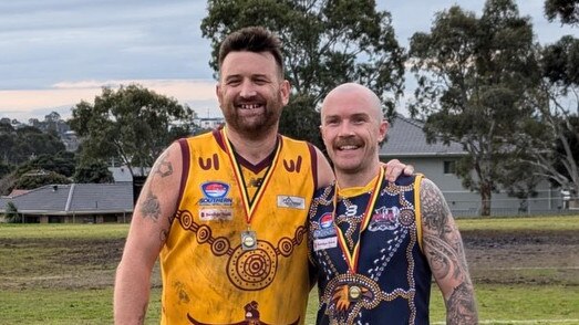 Brendon Groenendyk (L) with his best-afield medal.