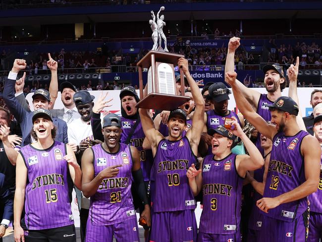 SYDNEY, AUSTRALIA - MARCH 15: The Sydney Kings pose with the Dr John Raschke trophy after winning game five of the NBL Grand Final series between Sydney Kings and New Zealand Breakers at Qudos Bank Arena, on March 15, 2023, in Sydney, Australia. (Photo by Mark Metcalfe/Getty Images)