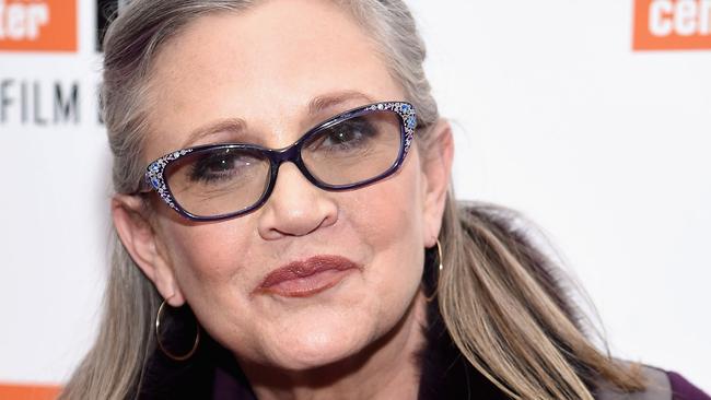 Hollywood star Carrie Fisher has died, four days after suffering a massive heart attack on a transatlantic flight, according to a family statement. Picture: AFP PHOTO / GETTY IMAGES NORTH AMERICA / Dimitrios Kambouris