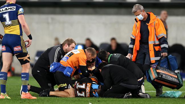 Michael Chee Kam was stretchered off after an on-field medical episode. Picture: Cameron Spencer/Getty