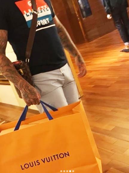 Chris Rymer shops at Louis Vuitton this month after his acquittal.