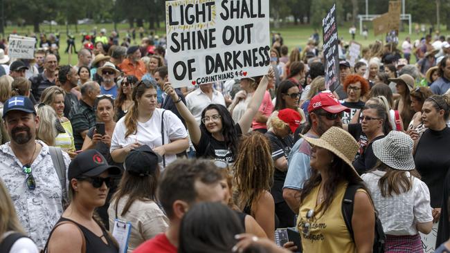 Protesters packed in tightly, many holding large placards and screaming chants. Picture: NCA NewsWire / David Geraghty