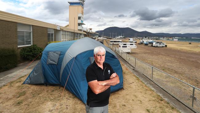 RAST chief Scott Gadd with one of the tents being used by people who cannot find accommodation in Hobart. Picture: NIKKI DAVIS-JONES