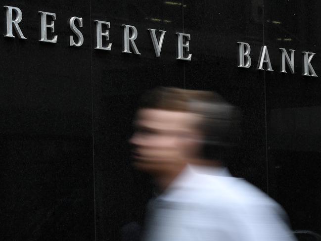 A pedestrian walks past the Reserve Bank of Australia (RBA) building in Sydney, Tuesday, March 3, 2020. The Reserve Bank is expected to cut the cash rate to a new record low 0.5 per cent on Tuesday. (AAP Image/Joel Carrett) NO ARCHIVING