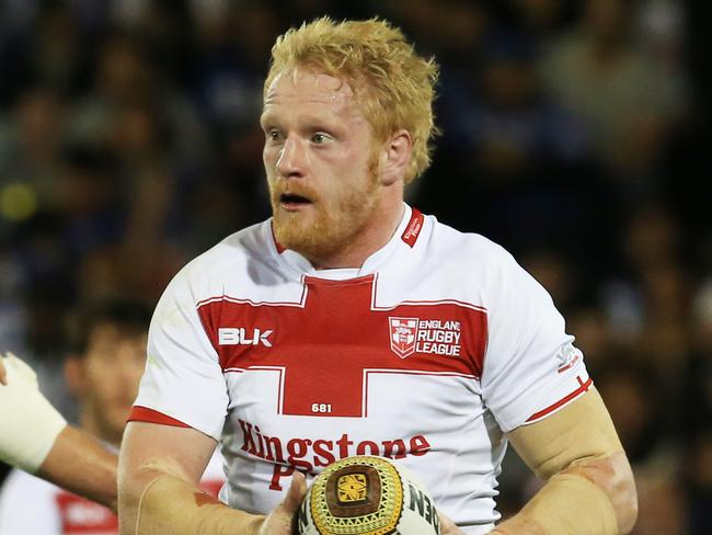 James Graham runs past Sam Burgess  during the England v Samoa Test match at Campbelltown Stadium. pic Mark Evans