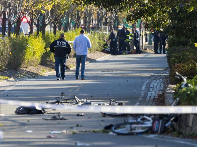 Bicycles and debris lay on a bike path near West and Houston Streets. Picture: AP