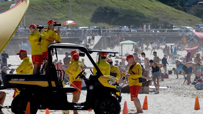 Surf Rescue volunteers are seen on patrol. Picture: NCA NewsWire/Bianca De Marchi