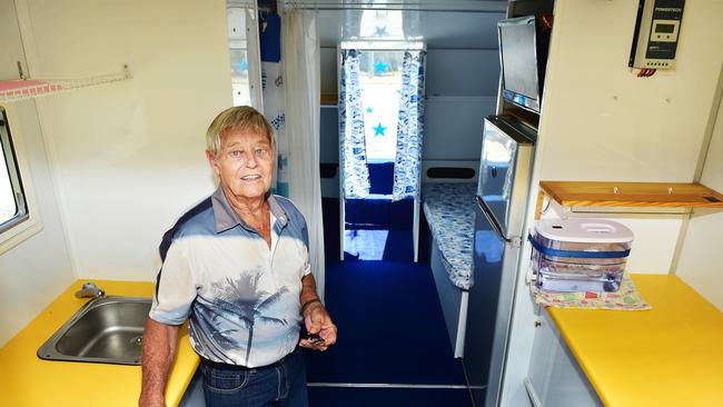 Al Toombs inside his trailable house boat which he built himself is now up for sale. Picture: Shae Beplate.