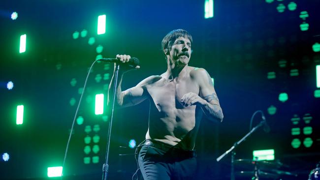 Red Hot Chili Peppers front man Anthony Kiedis performs at the Derwent Entertainment Centre in Hobart, after the lights came back on. Picture: PATRICK GEE