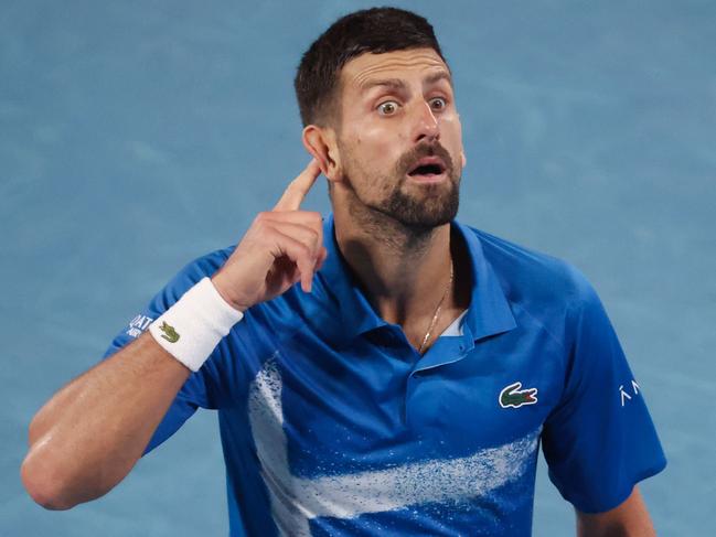 Djokovic teases Alcaraz by adopting his signature gesture to the crowd Picture: AFP