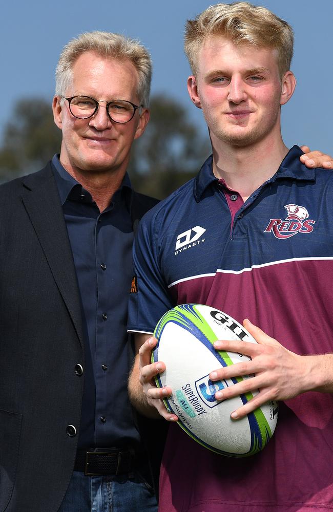 Tom Lynagh and his father former Wallaby Michael Lynagh pose for photos at Ballymore in Brisbane. Picture: NCA NewsWire / Dan Peled