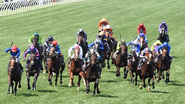 Kerrin McEvoy (red cap) captures the Melbourne Cup after a sensational ride aboard Cross Counter. Picture: Nicole Garmston