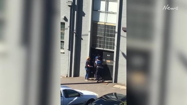 Police raid property in Port Melbourne