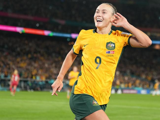 SYDNEY, AUSTRALIA - AUGUST 7: Caitlin Foord celebrates her first goal during the FIFA Women's World Cup Australia & New Zealand 2023 Round of 16 match between Australia and Denmark at Stadium Australia on August 7, 2023 in Sydney, Australia.(Photo by Fred Lee/Getty Images)