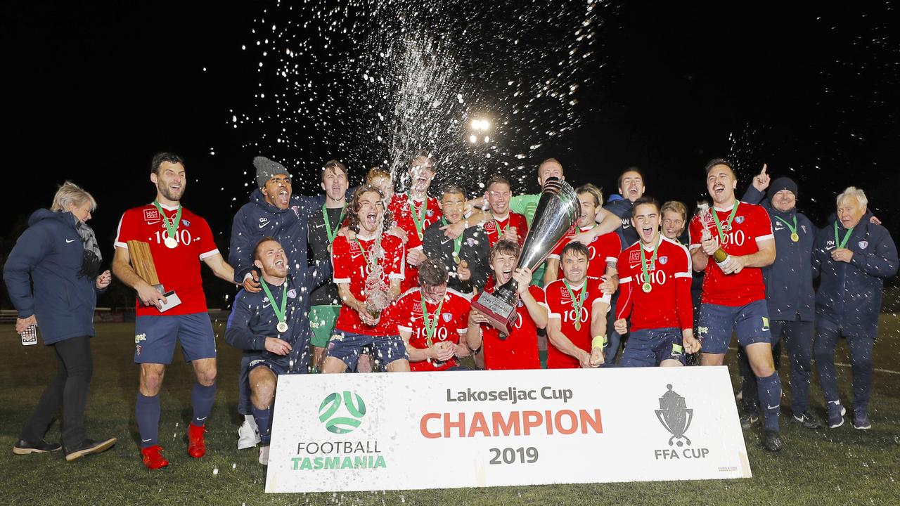 South Hobart players celebrate winning the Lakoseljac Cup final. Picture: PATRICK GEE