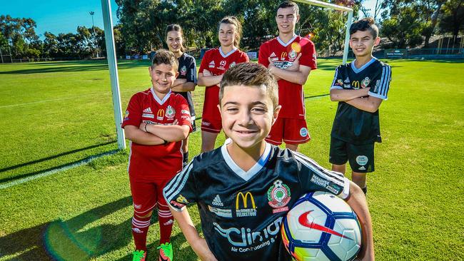 The ALP has promised $1.5m for a synthetic pitch at Campbelltown Soccer Club where Jean-Paul, 9, Jamie, 9, Alysia Covino, 19, Leena Maio, 16, Adrian Totani, 14 and Marco, 12, could play. Picture: Roy Vandervegt