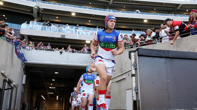 PERTH, AUSTRALIA - AUGUST 05: Kalyn Ponga of the Knights leads the team onto the field for the start during the round 23 NRL match between Dolphins and Newcastle Knights at Optus Stadium on August 05, 2023 in Perth, Australia. (Photo by Will Russell/Getty Images)