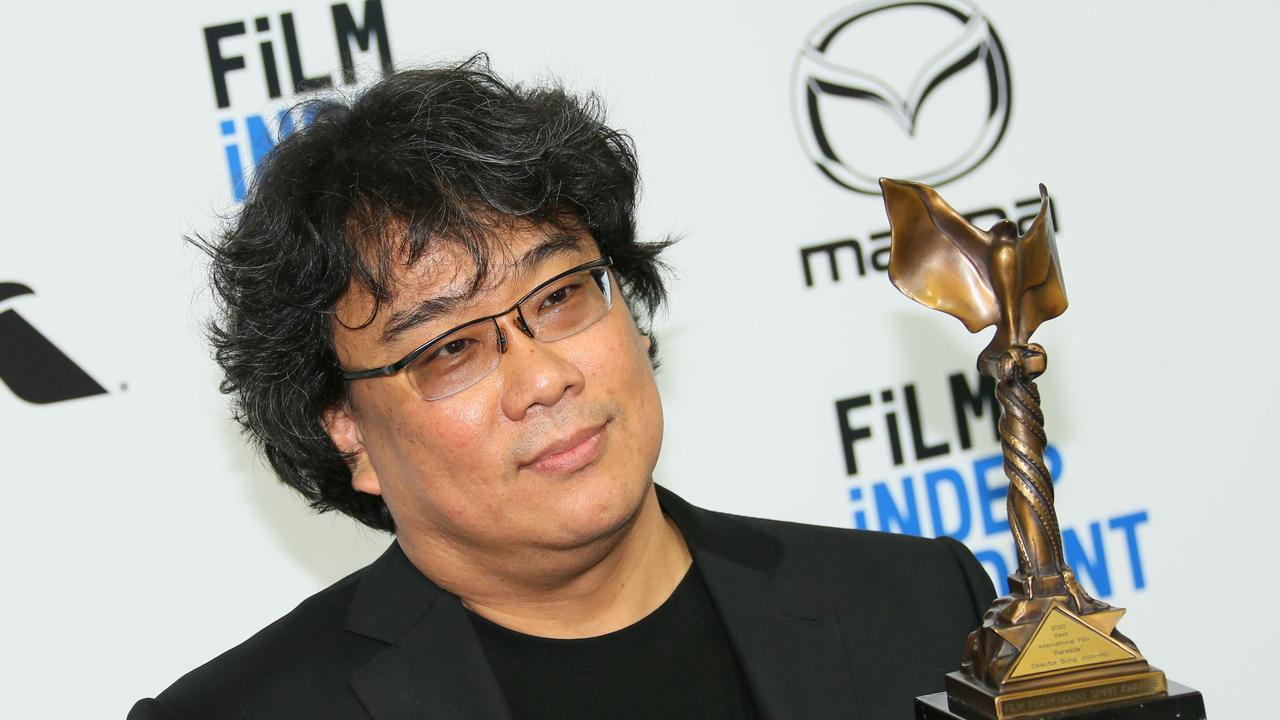 Bong Joon-ho won the WGA and BAFTA for his Parasite screenplay (Photo by Jean-Baptiste Lacroix / AFP)