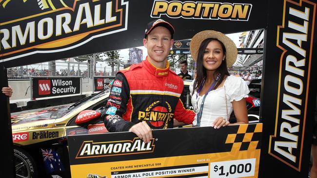 David Reynolds celebrating with his girlfriend Tahan Lew-Fatt after winning Pole Position in the Top Ten Shootout at the Newcastle 500. Picture: Tim Hunter.