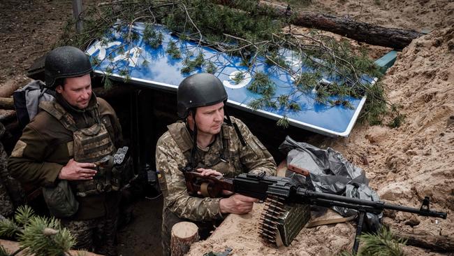 Ukrainian soldiers rest at their position near Lyman, eastern Ukraine. Picture: AFP