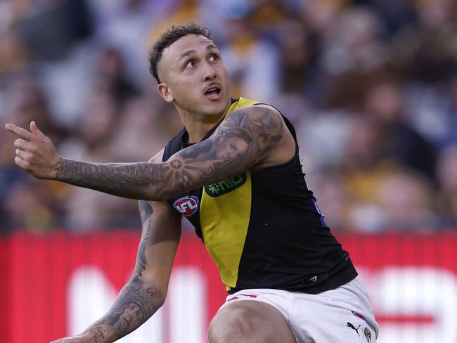 MELBOURNE, AUSTRALIA – AUGUST 18: Shai Bolton of the Tigers kicks a goal during the round 23 AFL match between Hawthorn Hawks and Richmond Tigers at Melbourne Cricket Ground, on August 18, 2024, in Melbourne, Australia. (Photo by Darrian Traynor/Getty Images)