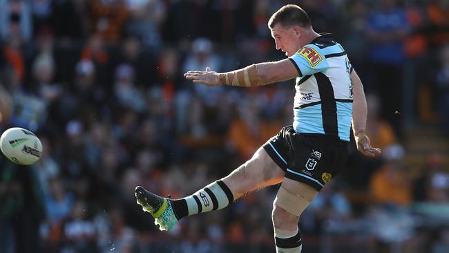 SYDNEY, AUSTRALIA - SEPTEMBER 08: Paul Gallen of the Sharks kicks a drop goal during the round 25 NRL match between the Wests Tigers and the Cronulla Sharks at Leichhardt Oval on September 08, 2019 in Sydney, Australia. (Photo by Mark Metcalfe/Getty Images)