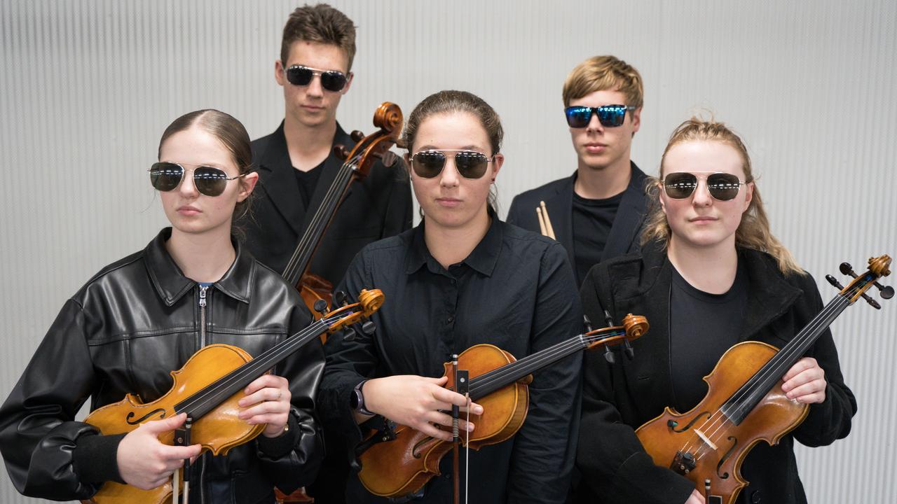 Ben and Jonah Peters (back row) Gabby Pellow, Ella Peters and Mikaela Suthers from Toowoomba Regional Youth Orchestra are set to bring a night of spy music to the city this weekend. Picture: Christine Schindler