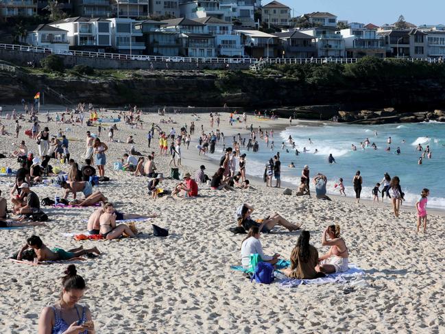 Bronte Beach was busy yesterday, despite the southern end of the beach being closed because of sewage contamination. Picture: Damian Shaw