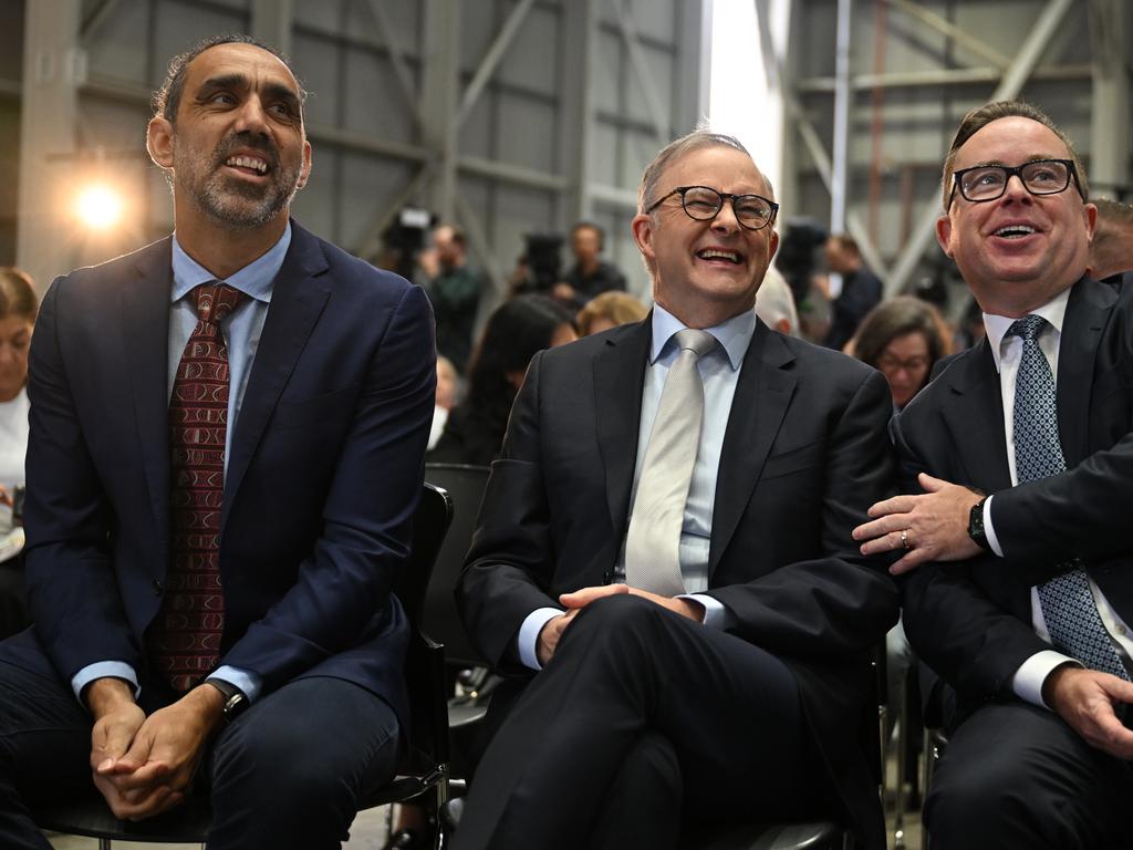 Adam Goodes, Prime Minister Anthony Albanese and former Qantas CEO Alan Joyce share a laugh together. Picture: AAP Image/Dean Lewins