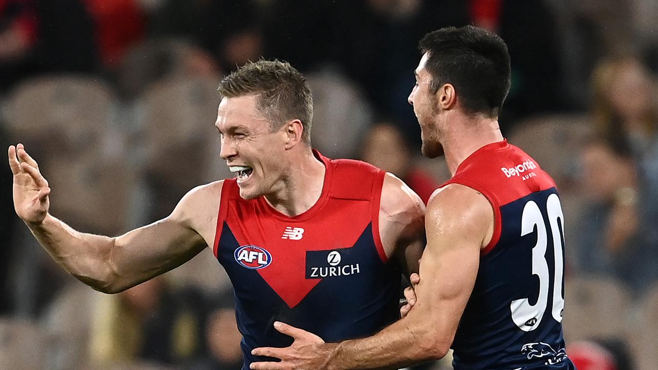 Tom McDonald and Alex Neal-Bullen enjoy a goal during Melbourne’s triumph.