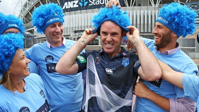 NSW Origin coach Brad Fittler wasted no time in embracing the madcap ways of Blues supporter group Blatchy’s Blues. Picture: Toby Zerna
