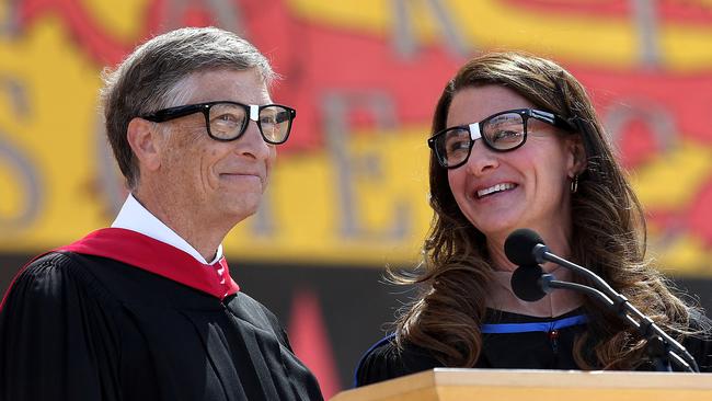 Bill Gates shares the stage with his wife Melinda in 2014. Picture: Justin Sullivan/Getty Images/AFP