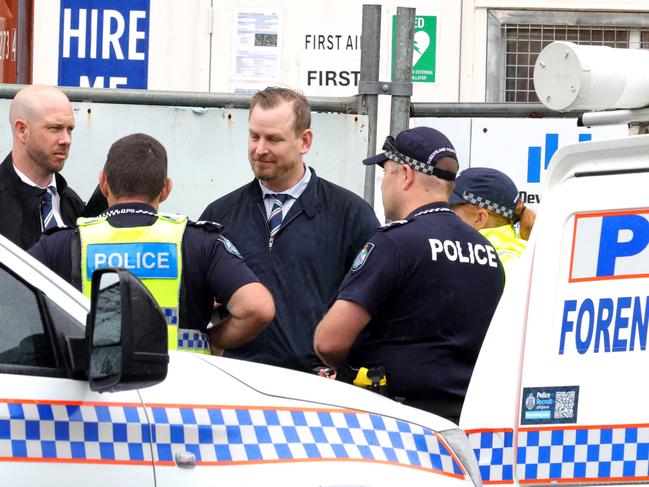 Police at the scene where a worker is fighting for life after a workplace incident where he was hit with a metal object, Wyandra Street, Newstead - on Tuesday 19th of November 2024 - Photo Steve Pohlner