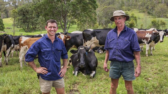 James McRae (left) and his father, Chris, on Raelands Farm at Barrington NSW where they have implemented heat-detection collars in their herd and built a new solids trap to better manage dairy waste. Picture: Dallas Kilponen