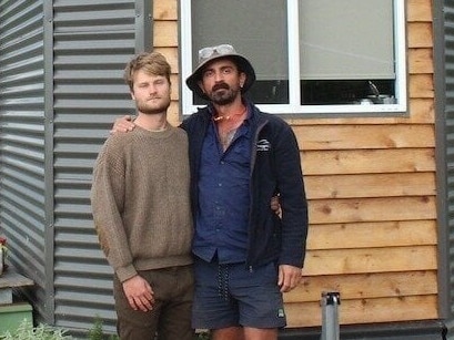 Manu Bohn (right) and his partner built their tiny house in 2023 Picture: Change.org