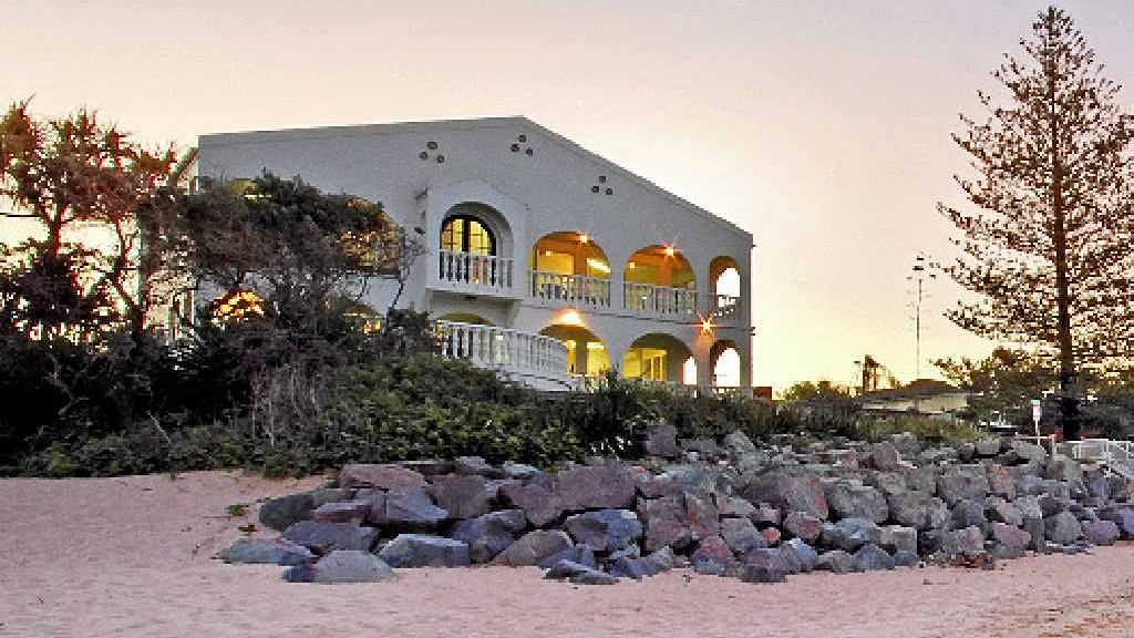 BEACHFRONT: The $4.9 million property at 2 Cooroora St perched on Moffat Beach.