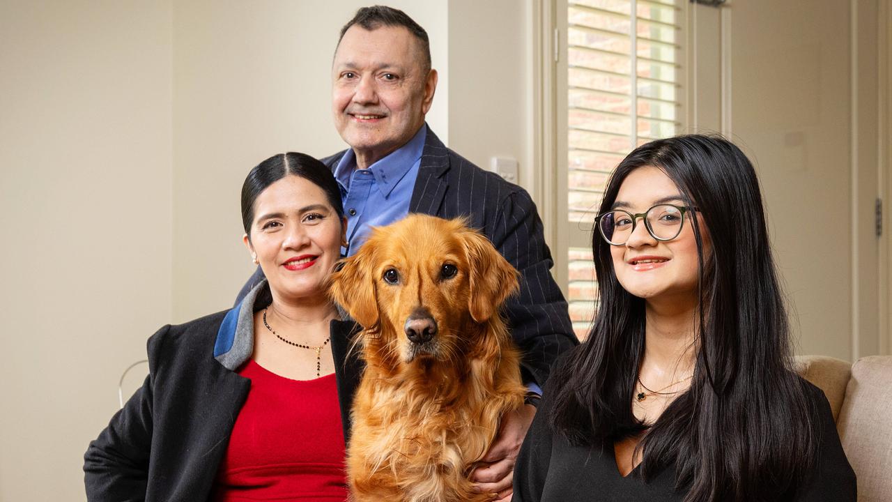 Property investor Philip Stork, his wife Banly Borromeo, daughter Hayley, 16, and dog Nelson.