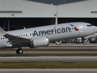 MIAMI, FLORIDA - DECEMBER 29: American Airlines flight 718, a Boeing 737 Max, takes of from Miami International Airport on its way to New York on December 29, 2020 in Miami, Florida. The Boeing 737 Max flew its first commercial flight since the aircraft was allowed to return to service nearly two years after being grounded worldwide following a pair of separate crashes.   Joe Raedle/Getty Images/AFP == FOR NEWSPAPERS, INTERNET, TELCOS & TELEVISION USE ONLY ==