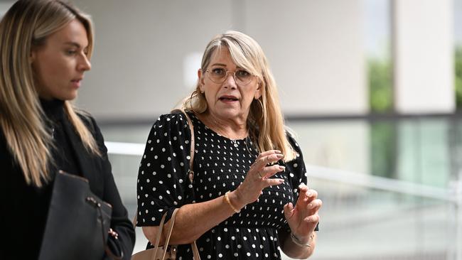 Vicki Blackburn, the mother of murder victim Shandee Blackburn, leaves the commission of inquiry into forensic DNA testing at the Magistrates Court in Brisbane.