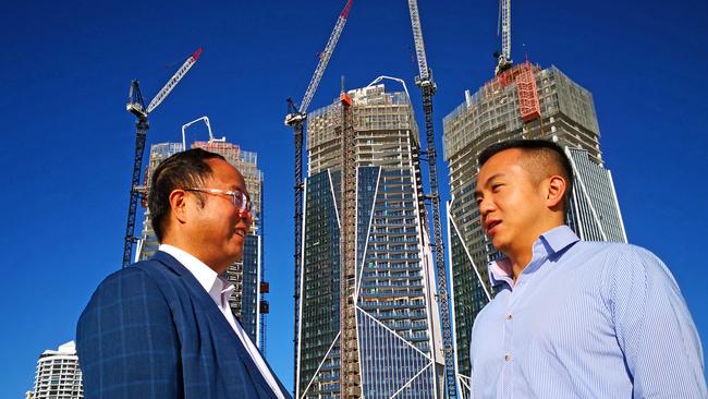 Xiangmo Huang and his son Jimmy Huang at the construction site for Jewel, which is now owned by their company Yuhu Group. Photo: Supplied