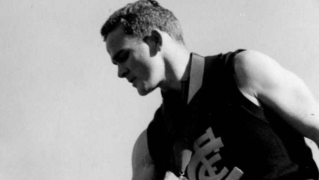 Star Carlton defender John James receives his Brownlow Medal in 1961. Picture: Herald Sun