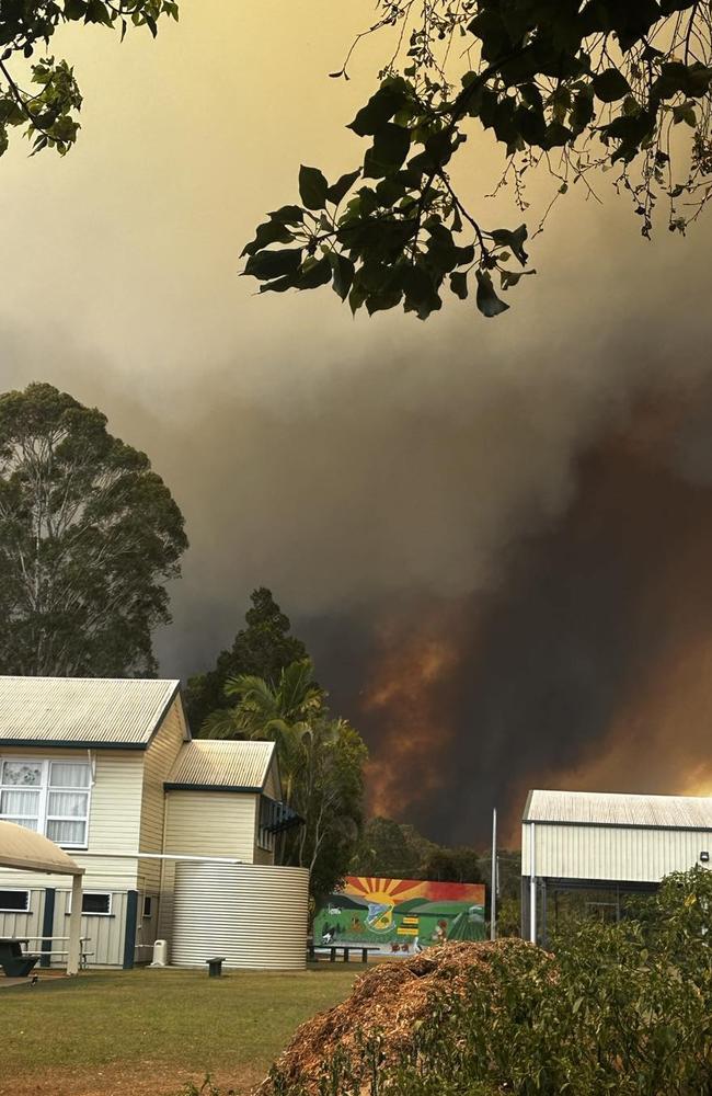 Goodwood State School teacher Teresa Fitch shared this image of the flames approaching the school, moments before they were evacuated.