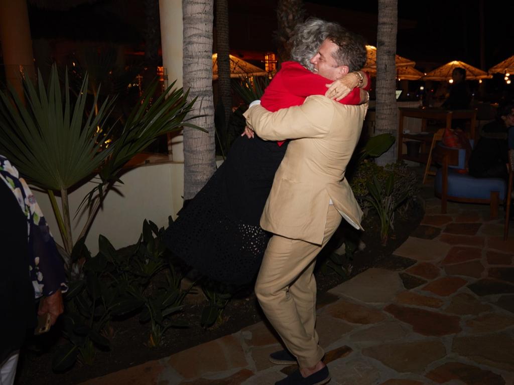 Karl Stefanovic hugs mum Jenny at the official welcome party for their weekend wedding..