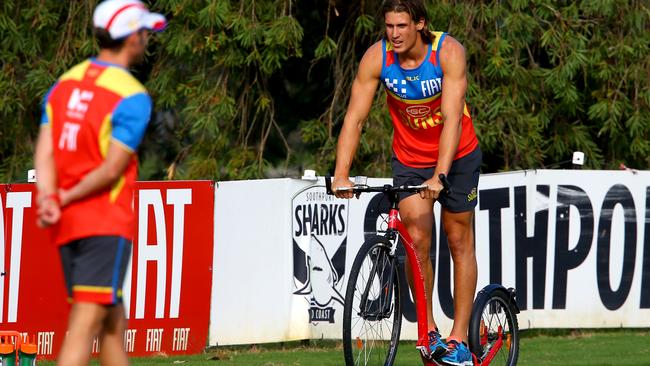 David Swallow rehabs his knee injury at Gold Coast training. Picture: David Clark