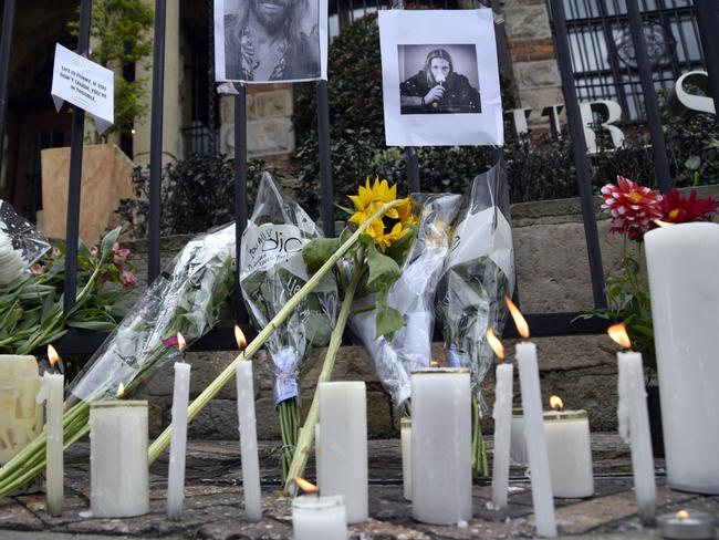 Candles and flowers placed outside the Casa Medina Hotel where the Foo Fighter’s drummer Taylor Hawkins was found dead on March 26 in Bogota, Colombia. Picture: Guillermo Legaria/Getty Images